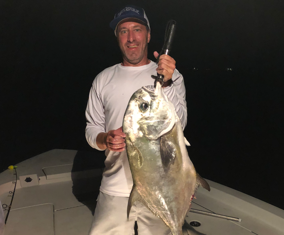 Captain Jon in Backcountry holding Permit in front